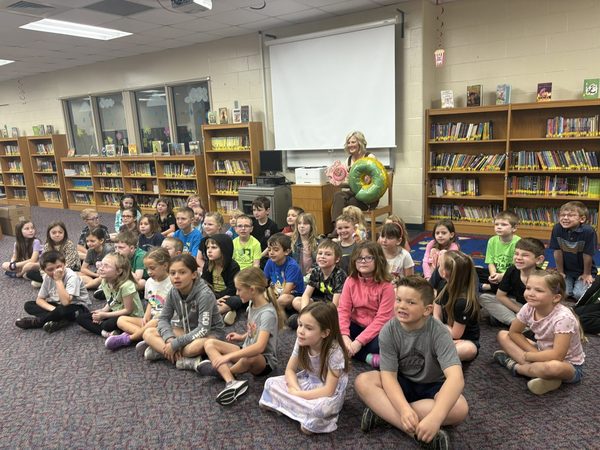 Children gathered together for an I Love You Like A Donut library storytime